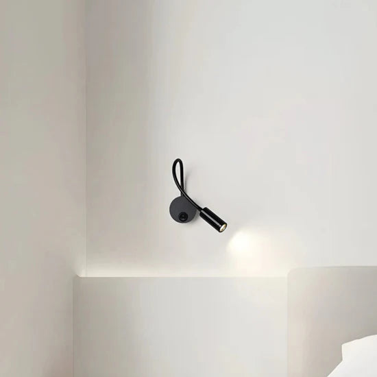 Lumio Flexible black LED wall lamp for indoor use