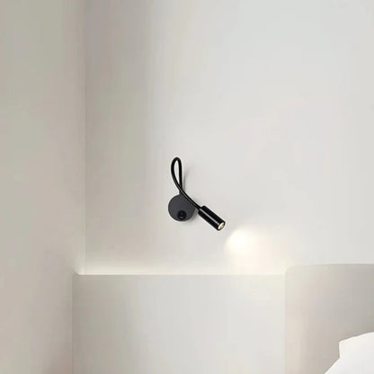 Lumio Flexible black LED wall lamp for indoor use